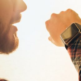 Man using voice search on his smartwatch